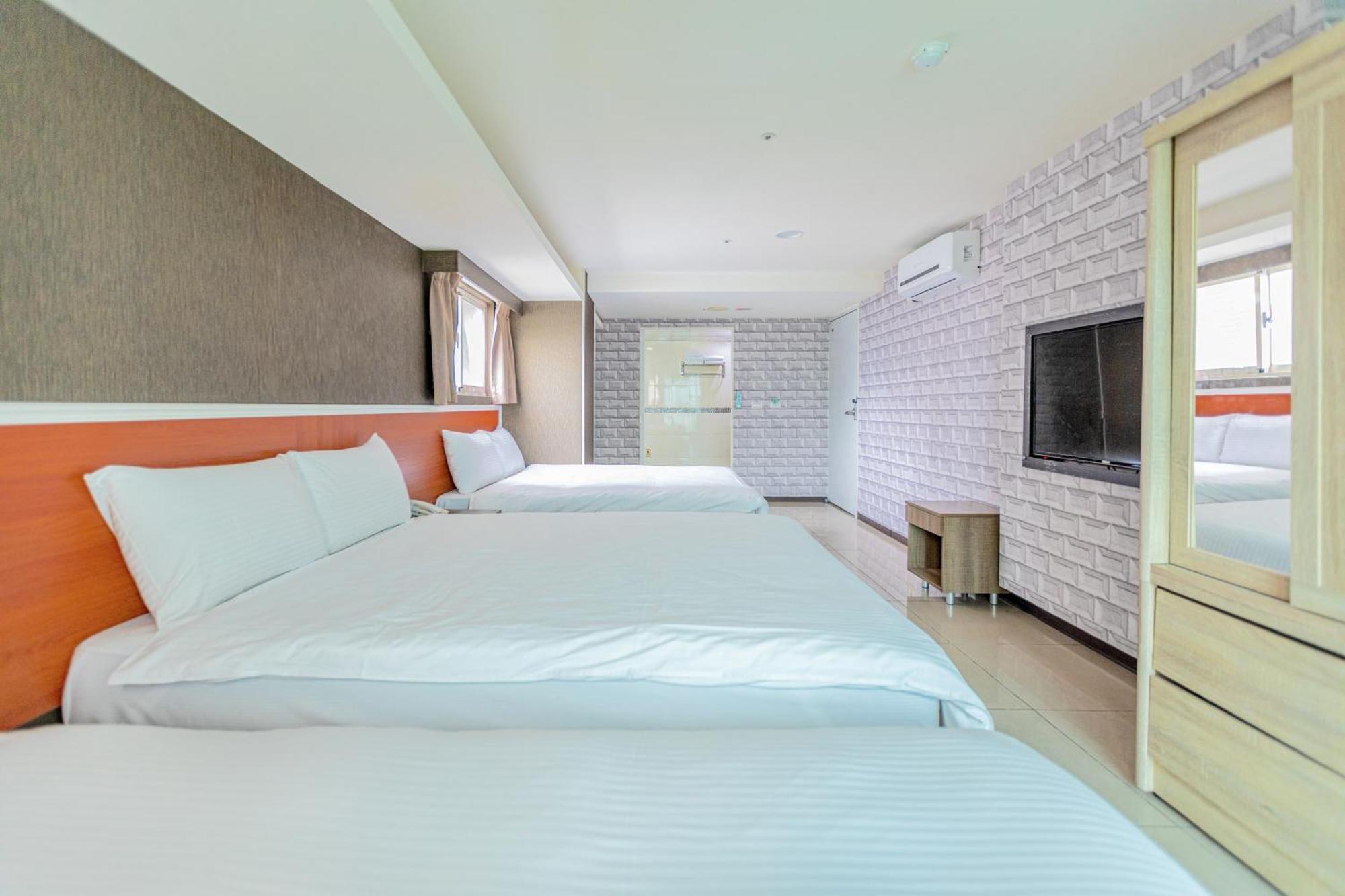 E Lim Hotel Zhongli Zimmer foto