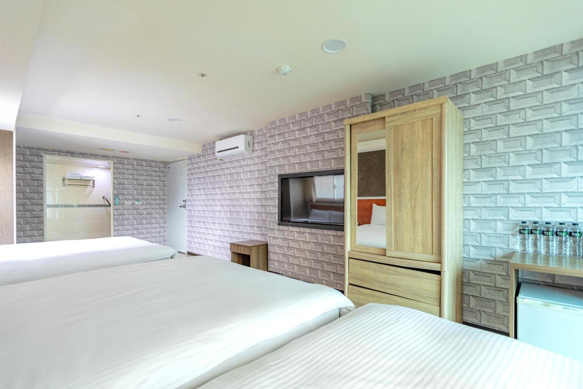 E Lim Hotel Zhongli Zimmer foto