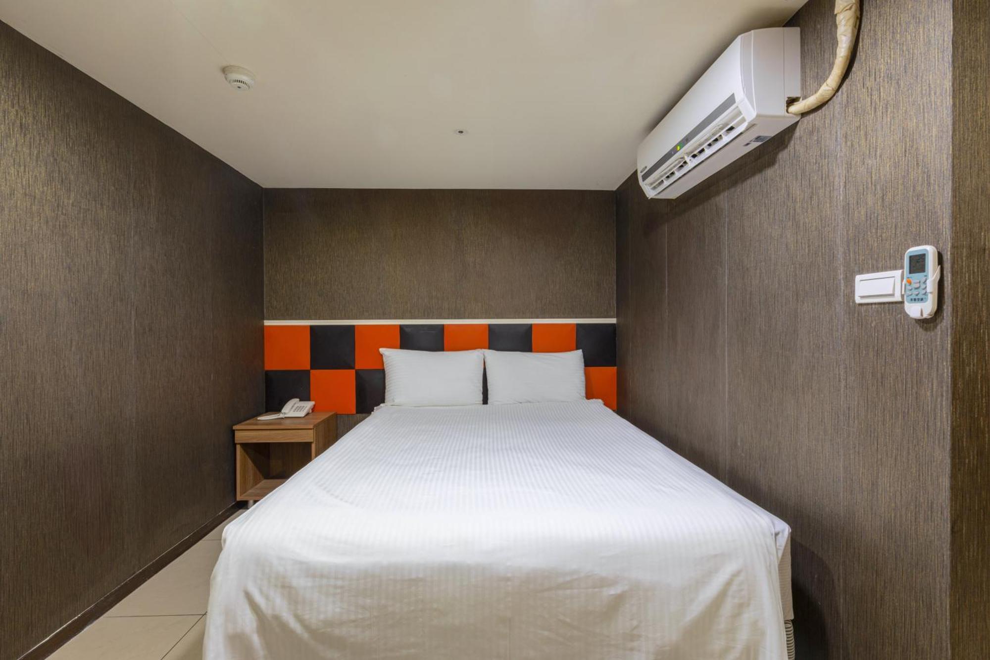 E Lim Hotel Zhongli Zimmer foto