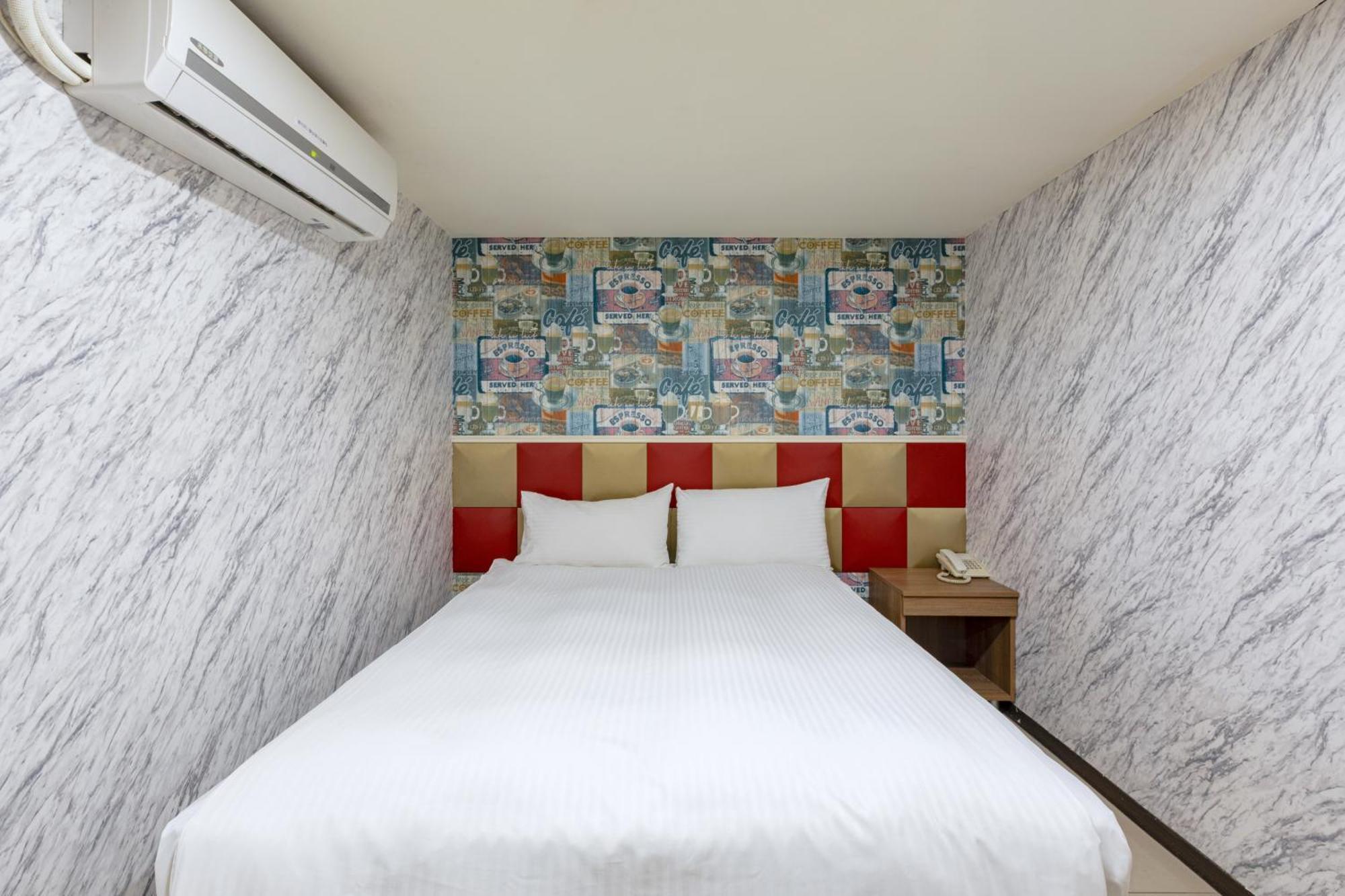 E Lim Hotel Zhongli Zimmer foto