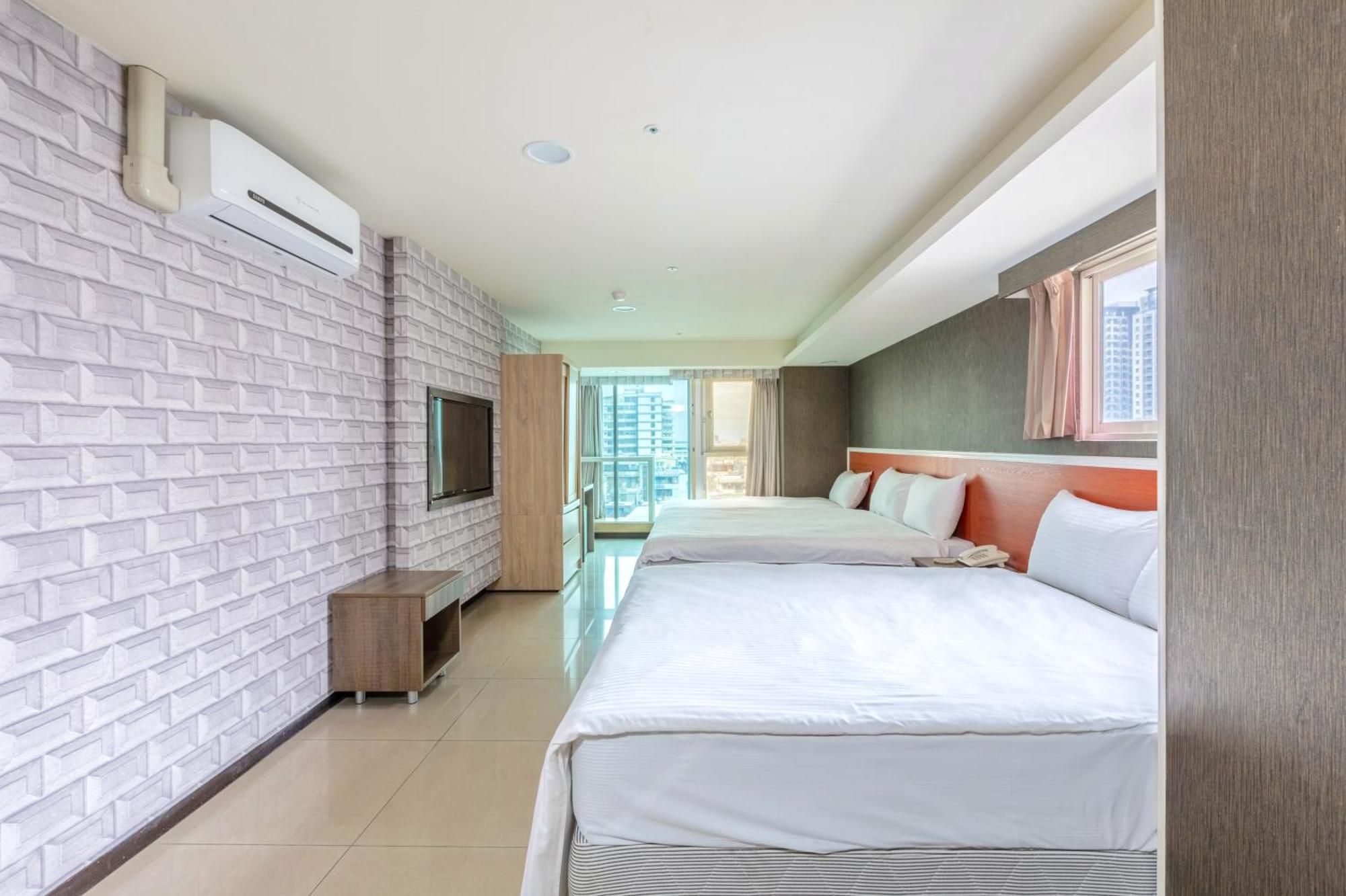 E Lim Hotel Zhongli Zimmer foto