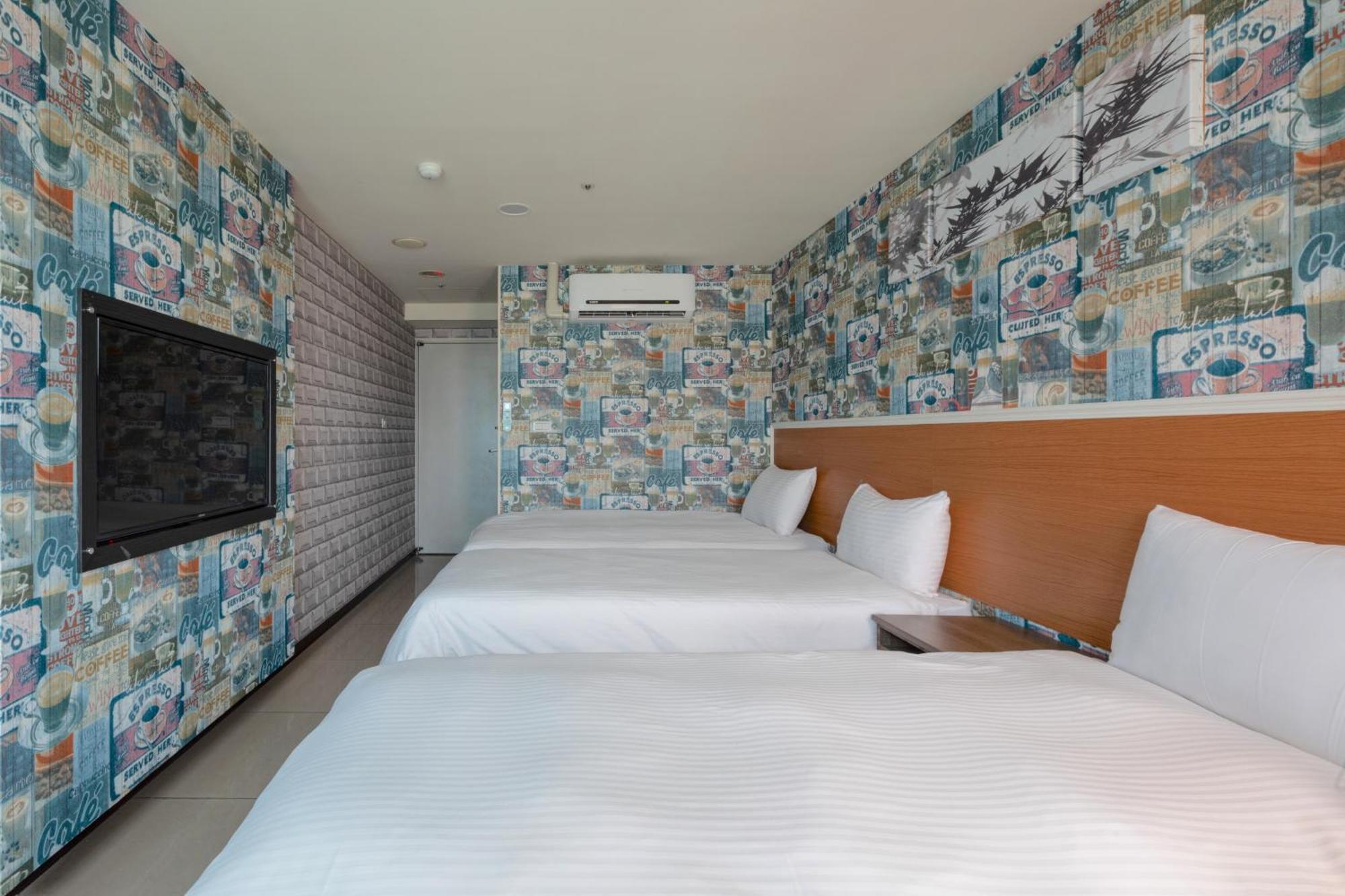E Lim Hotel Zhongli Zimmer foto