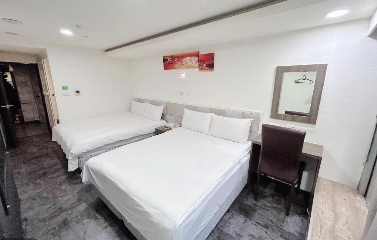 E Lim Hotel Zhongli Zimmer foto